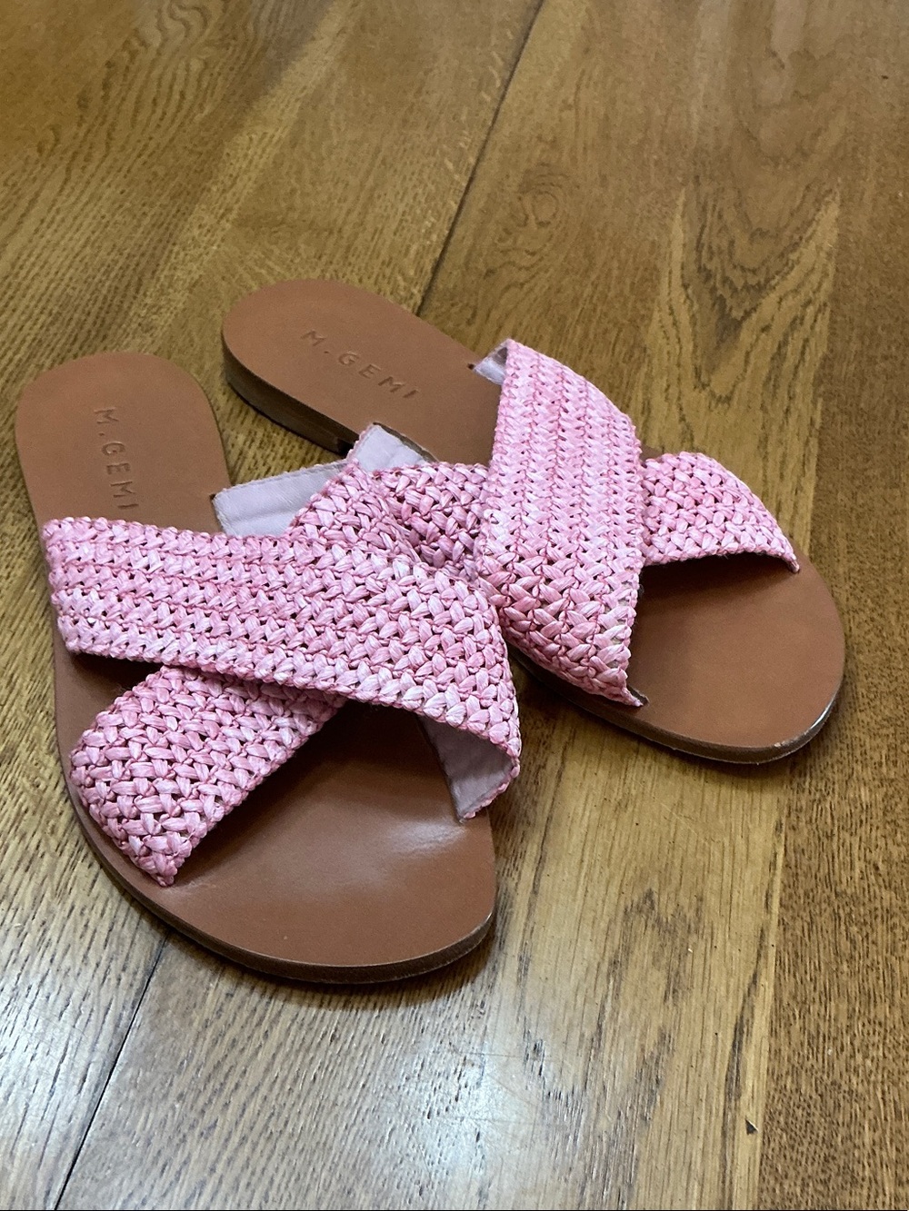 Woman’s M. Gemi The Gabriella pink raffia straps cross slide sandal. Size 38.